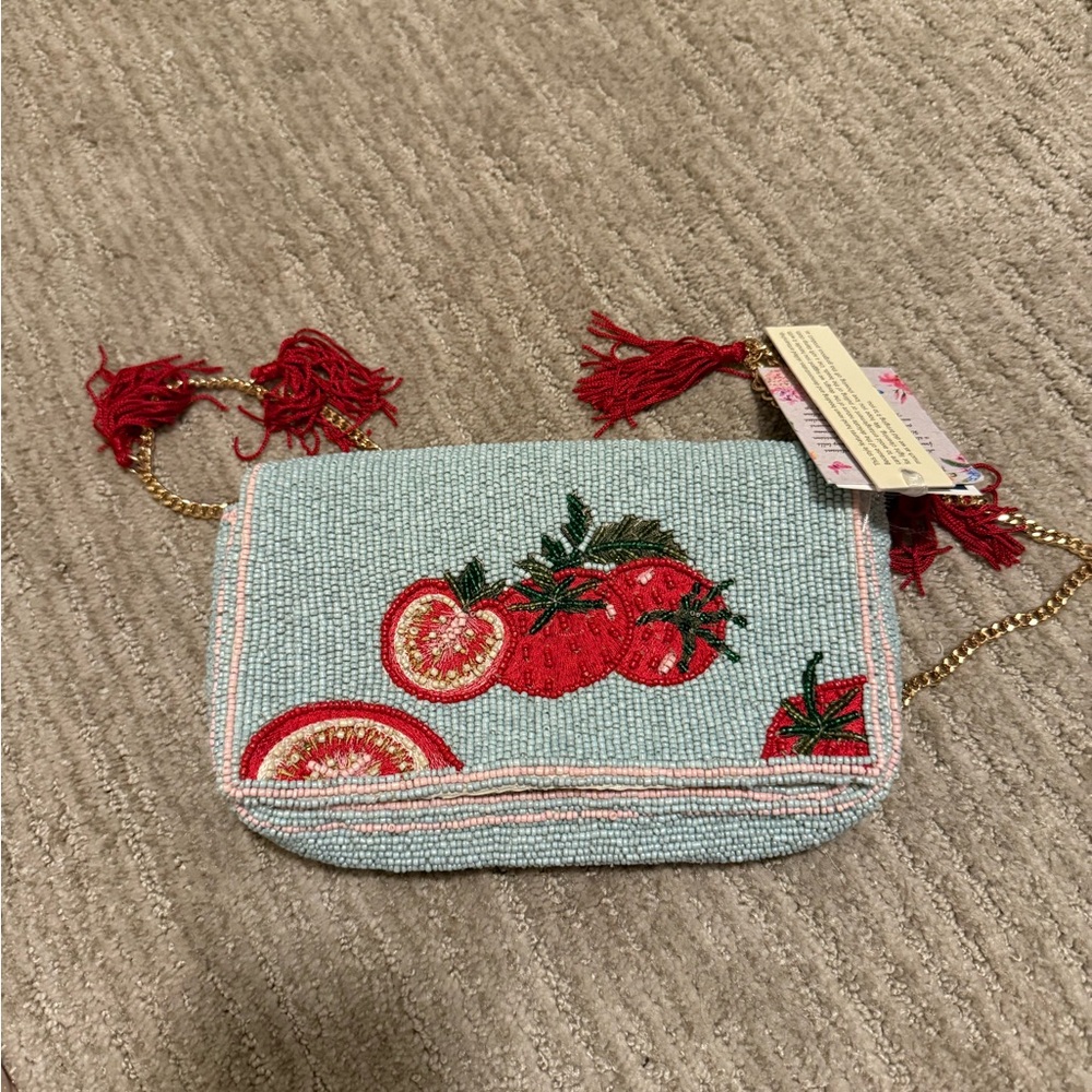 Viral tomato beaded bag.